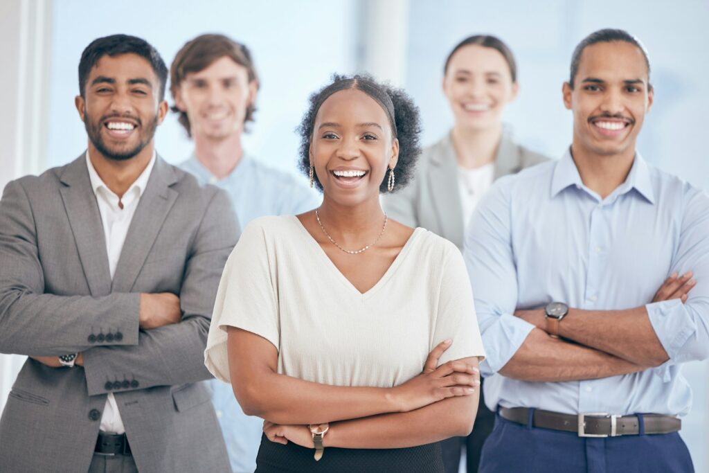 A happy team makes for a great work environment. Shot of a group of businesspeople at work.